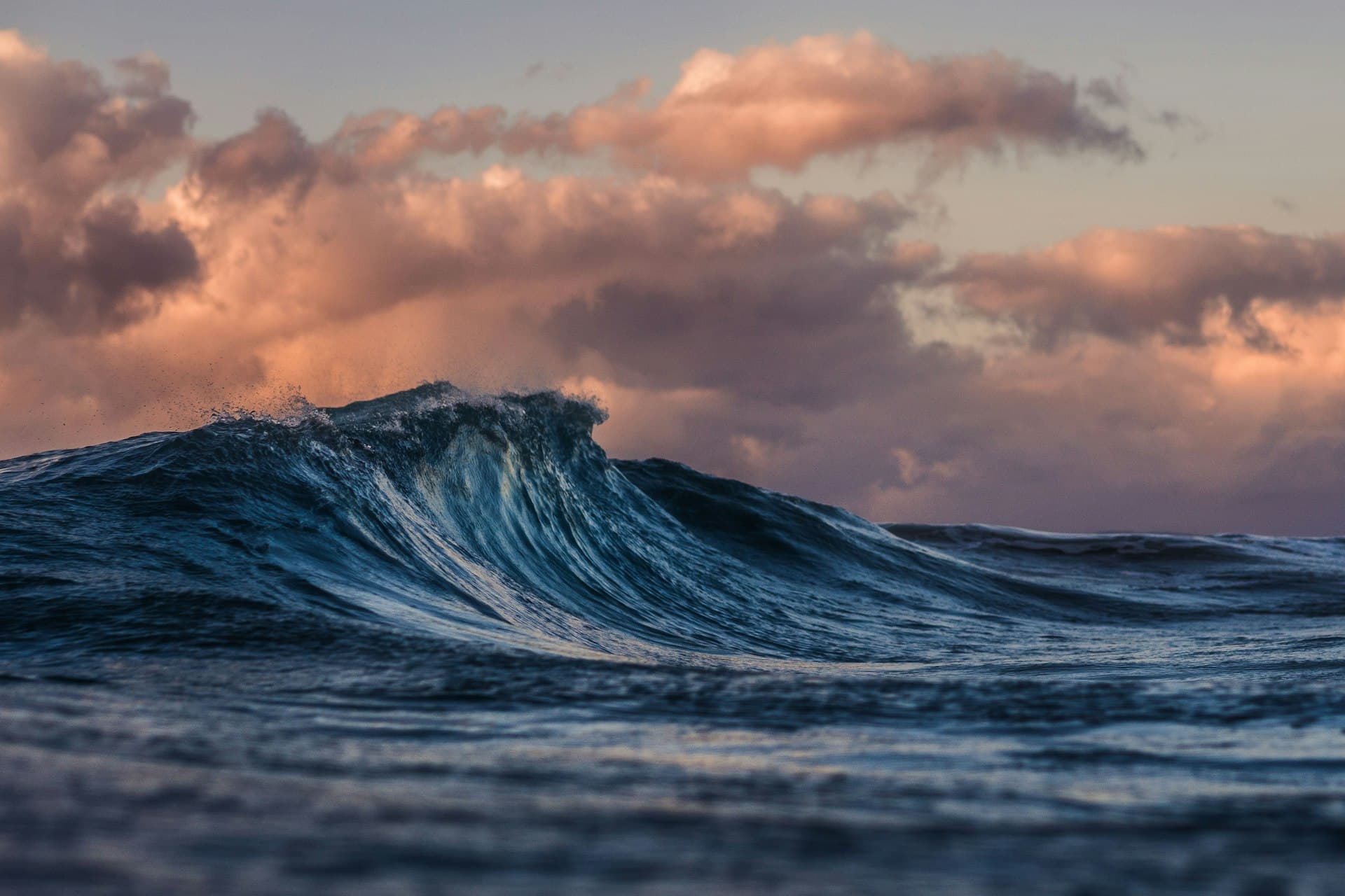 A wave breaking at golden hour